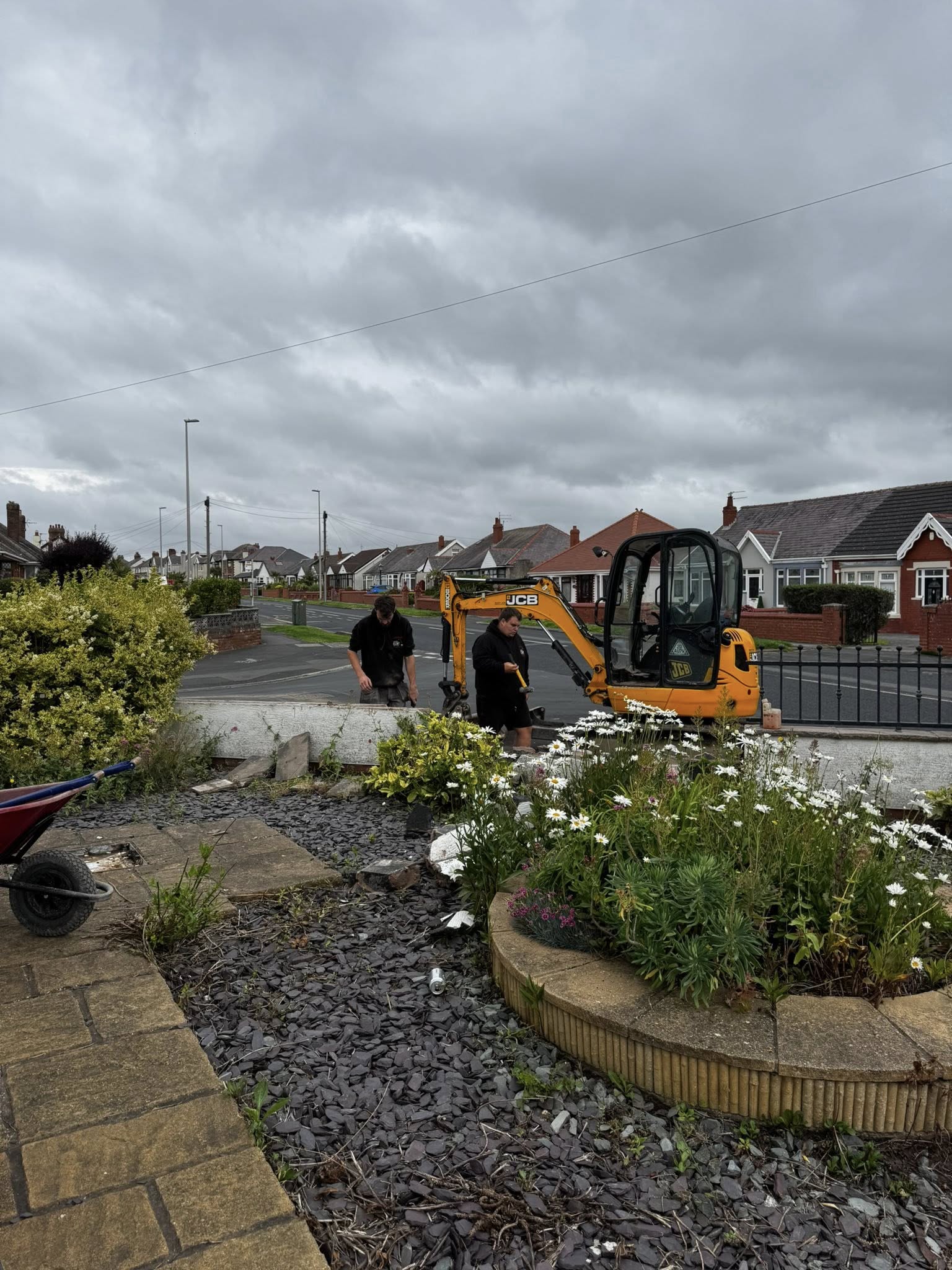 Plant hire machinery operating on a residential site